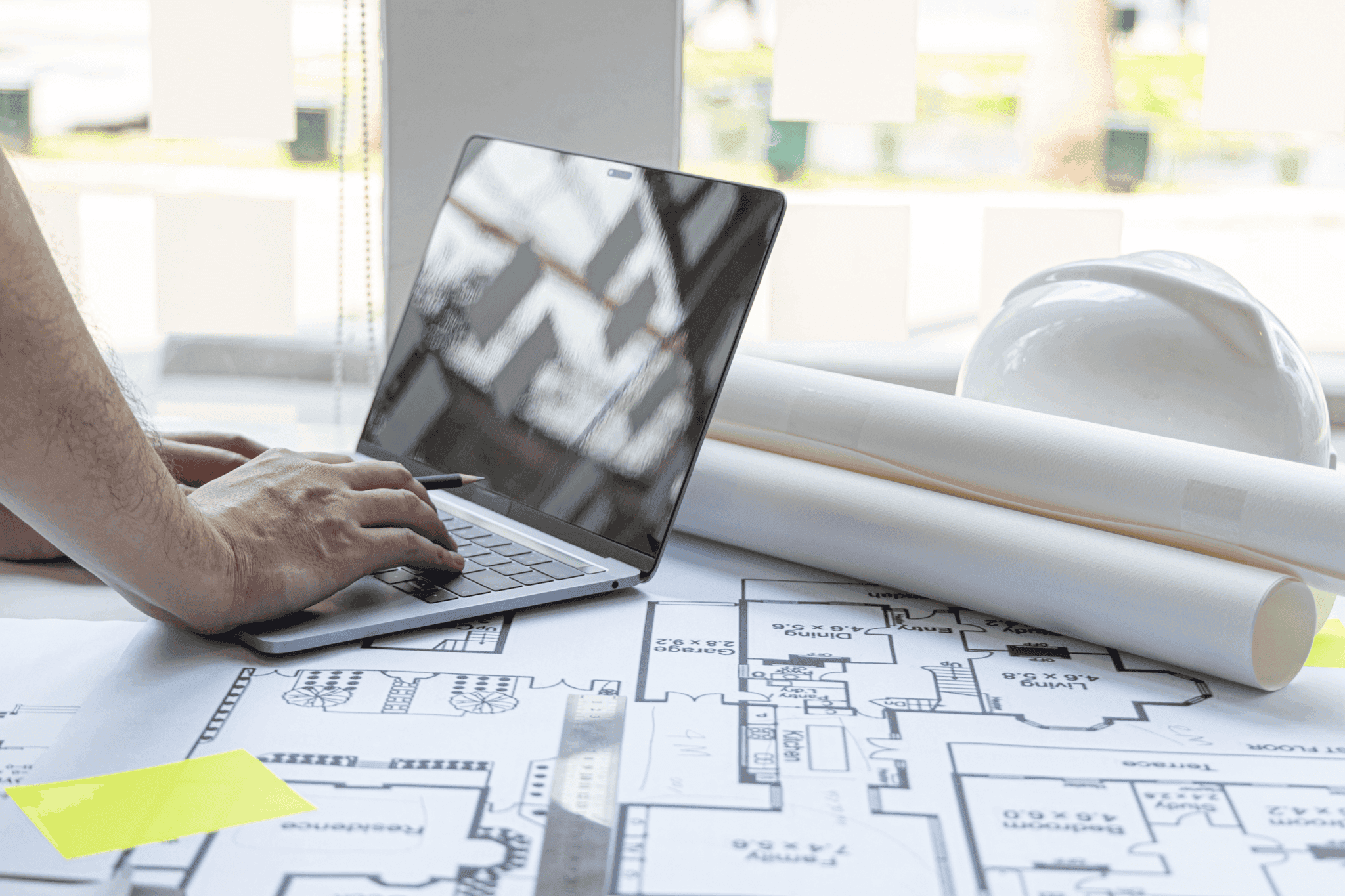 Technical documentation and single-line diagram on a desk